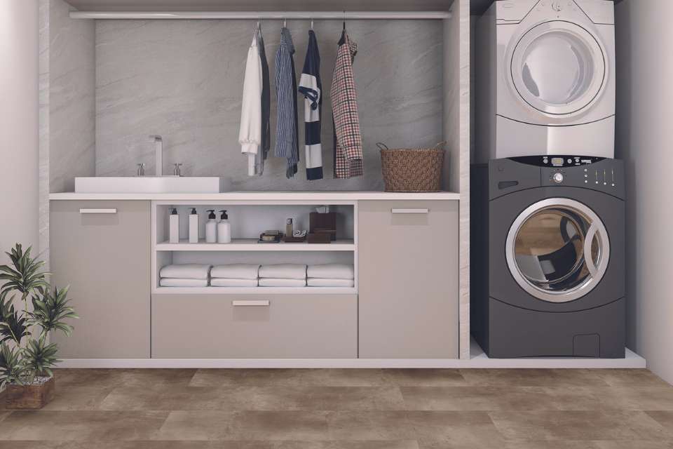 stone look luxury vinyl in modern laundry room